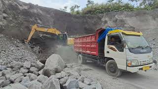 excavator working in sand mining loads sand into dump truck [upl. by Akers629]