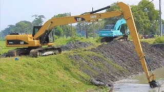 Long Arm Excavator Digging The River Canal CAT 320D L Komatsu PC200 [upl. by Kenney]