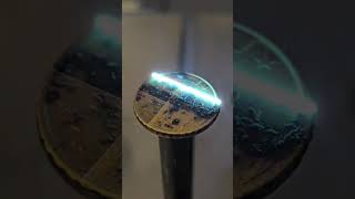 Cleaning a coin with laser satisfying cool shorts amazing interesting clips [upl. by Namwob624]