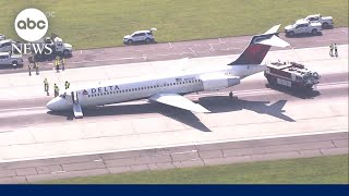 Delta flight makes emergency landing without gear [upl. by Akiner428]