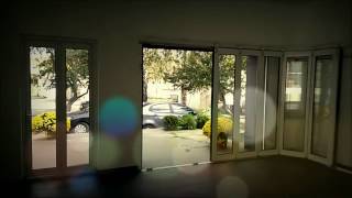 Side Sliding Garage Door in Glazed Panels [upl. by Aowda]