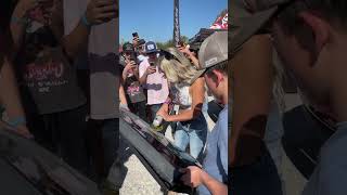 Lindsay Bercosky signing a tail gate with an angle grinder automobile [upl. by Rana]