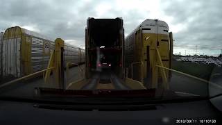 Loading and unloading a vehicle onto a railcar [upl. by Ardied]