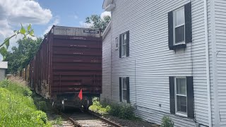 Freight train feet from houses Mass Central Railroad [upl. by Rikahs]