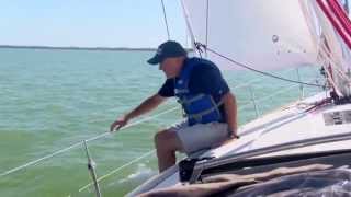 Offshore Sailing School  Adjusting the Fairlead on the Loaded Jib Sheet [upl. by Chastain]