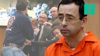 Victims Father Tries To Attack Larry Nassar In Court [upl. by Haerle]