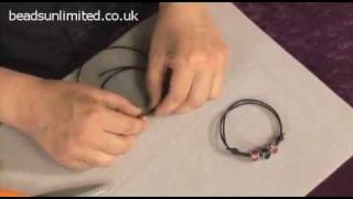 Bracelet on Leather  The Beginners Guide to Beading [upl. by Dnilasor]