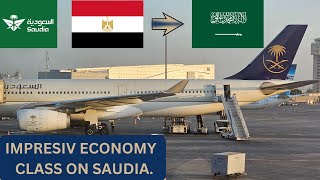 TRIP REPORT  SAUDIA AIRLINES  FIRST TIME IN ECONOMY CLASS  AIRBUS A330300  CAIRO TO MEDINA [upl. by Misak754]