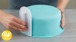 How to Cover a Round Cake with Fondant  Wilton [upl. by Pauli]