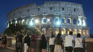 Visitors enjoy awesome spectacle of Romes Colosseum at night [upl. by Otilrac]