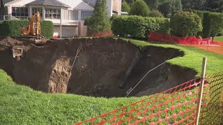 Sunday’s historic flooding caused massive sinkhole to form at the Waterview event venue in Monroe [upl. by Shelburne856]