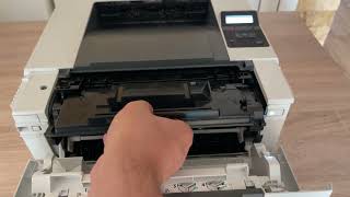 Cum inlocuiesc cartusul HP LaserJet M404dn M404dw M404n M304a M406dn CF259A 59A CF259X 59X [upl. by Jaine485]