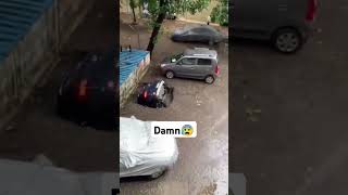 Car sinks into deep hole😰shorts youtubeshorts [upl. by Etnuahc]