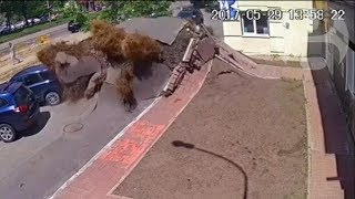 Underground water pipe explosion destroys road in Ukraine [upl. by Enelie]