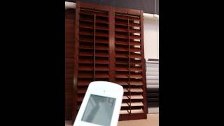 Motorized wood plantation shutters [upl. by Nehtanhoj]