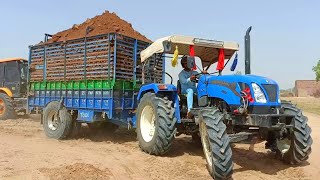 New Holland 4710 tractor 4x4 fully loaded trolla with Soil stuck tractor [upl. by Ahsennek]