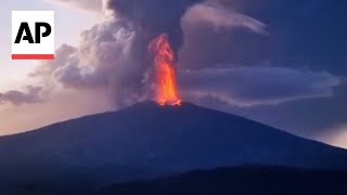 Italys Mount Etna volcano erupts with 10kilometerhigh volcanic cloud [upl. by Wulfe]