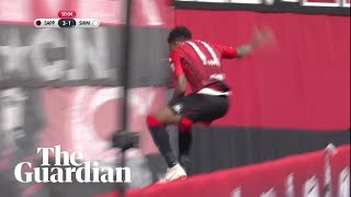 Goal celebration goes wrong as JLeague striker misjudges drop behind advertising board [upl. by Aivax]