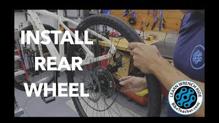 How to install a rear wheel with a derailleur [upl. by Elleb332]