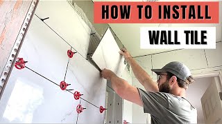 How to Install Tile on the Bathroom Wall StepbyStep [upl. by Ralip]