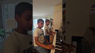 peppa pig theme song piano by 7 and 9 years old Pianists [upl. by Uella]