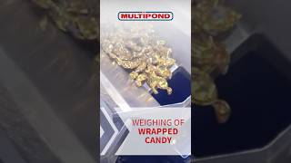 Weighing of wrapped Candy  multiheadweigher [upl. by Omolhs]