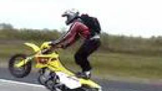 SUZUKI DRZ400 CRAZY STAND ON WHEELIE [upl. by Nylcsoj]