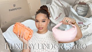 DESIGNER HANDBAGS UNDER 300  Margiela Ganni Staud etc  Huge Farfetch Haul [upl. by Slrahc]