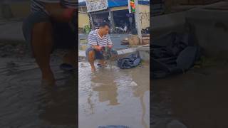 Remove plastic blockage water flow into Culvert Drain cleaning shorts culvert plastic [upl. by Alhahs]