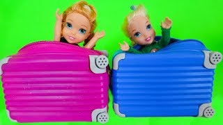 Elsa and Anna toddlers buy suitcases to go on holidays [upl. by Reinhart479]