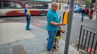 How someone who is blind or partially sighted crosses the road [upl. by Setiram]