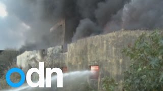 Huge fire rips through storage yard in China [upl. by Ailam]