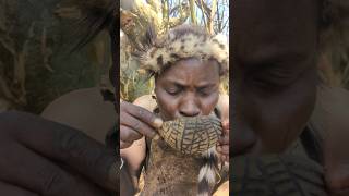 See Hadzabe men sharing wild cat soup at lunch time short [upl. by Animsaj]