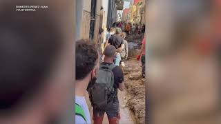 Volunteers Sing Valencias Anthem as They Clean After Devastating Flood [upl. by Aiciled]