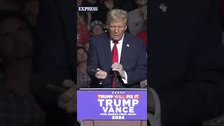 This mic STINKS Donald Trump rips mic from stand during rally [upl. by Amsab]