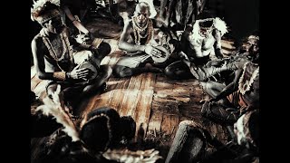 Asmat tribe  90 seconds of traditional drum play [upl. by Karolina]