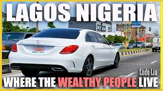 Lagos Nigeria where the wealthy people live  4 K Immersive Motorcycle Ride in Nigeria [upl. by Fries]