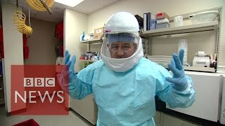 Ebola How doctors protect themselves from the virus  BBC News [upl. by Olihs]