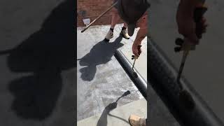 Traditional three layers flat roofing system using torch on felt ￼ [upl. by Driskill]