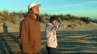 Surfers Jump Into Ocean to Help Rescue Fisherman [upl. by Otrebmuh]