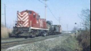 Red Barrons lead CNJ freight on the NYampLB at Holmdel NJ 1976 [upl. by Glassco]