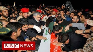 Qasem Soleimani Mourners flood the streets as body returns to Iran  BBC News [upl. by Ahsekam]