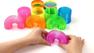 SMALLEST SLINKY how to play slinky KIDS SPRING TOYS [upl. by Atinrahc]