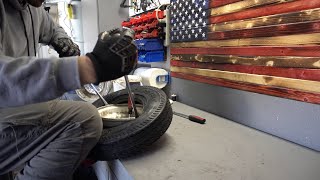 How to install a New Trailer tire on the rim with basic tools [upl. by Brok581]