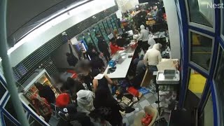 Video shows dozens of people ransacking store at Oakland gas station [upl. by Atenek]