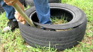 How to cut a tire and make it into a garden potwmv [upl. by Oivat549]