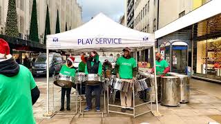 The Ebony Steel Band jamming Christmas tunes on Oxford Street [upl. by Lane170]