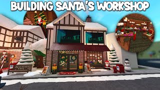 BUILDING SANTAS WORKSHOP AND GIFT WRAPPING IN MY NEW BLOXBURG CHRISTMAS TOWN [upl. by Ohploda]