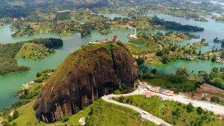 CLIMBING A GIANT ROCK IN GUATAPÉ COLOMBIA EL PEÑOL TRAVEL VLOG  Eileen Aldis [upl. by Anitnuahs]