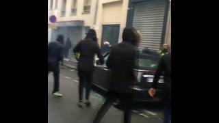 Yellow vest protesters destroy overturn car in Paris [upl. by Kowatch]